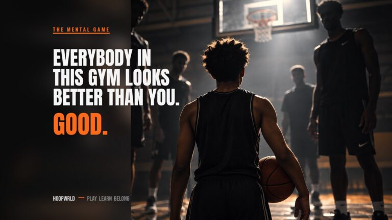 A single player shooting alone in an empty high school gym