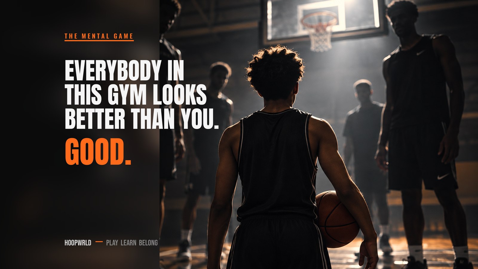 A single player shooting alone in an empty high school gym
